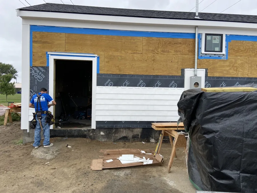 New vinyl siding installation on a home exterior